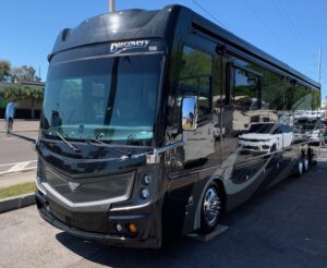 2019-Fleetwood-Discovery-44B-16k-miles-4-slides-bath-half-459hp-Cummins-prestigious-coach-scaled-1
