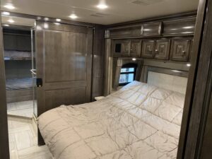2019-Fleetwood-Discovery-44B-16k-miles-4-slides-bath-half-459hp-Cummins-prestigious-coach5-scaled-1