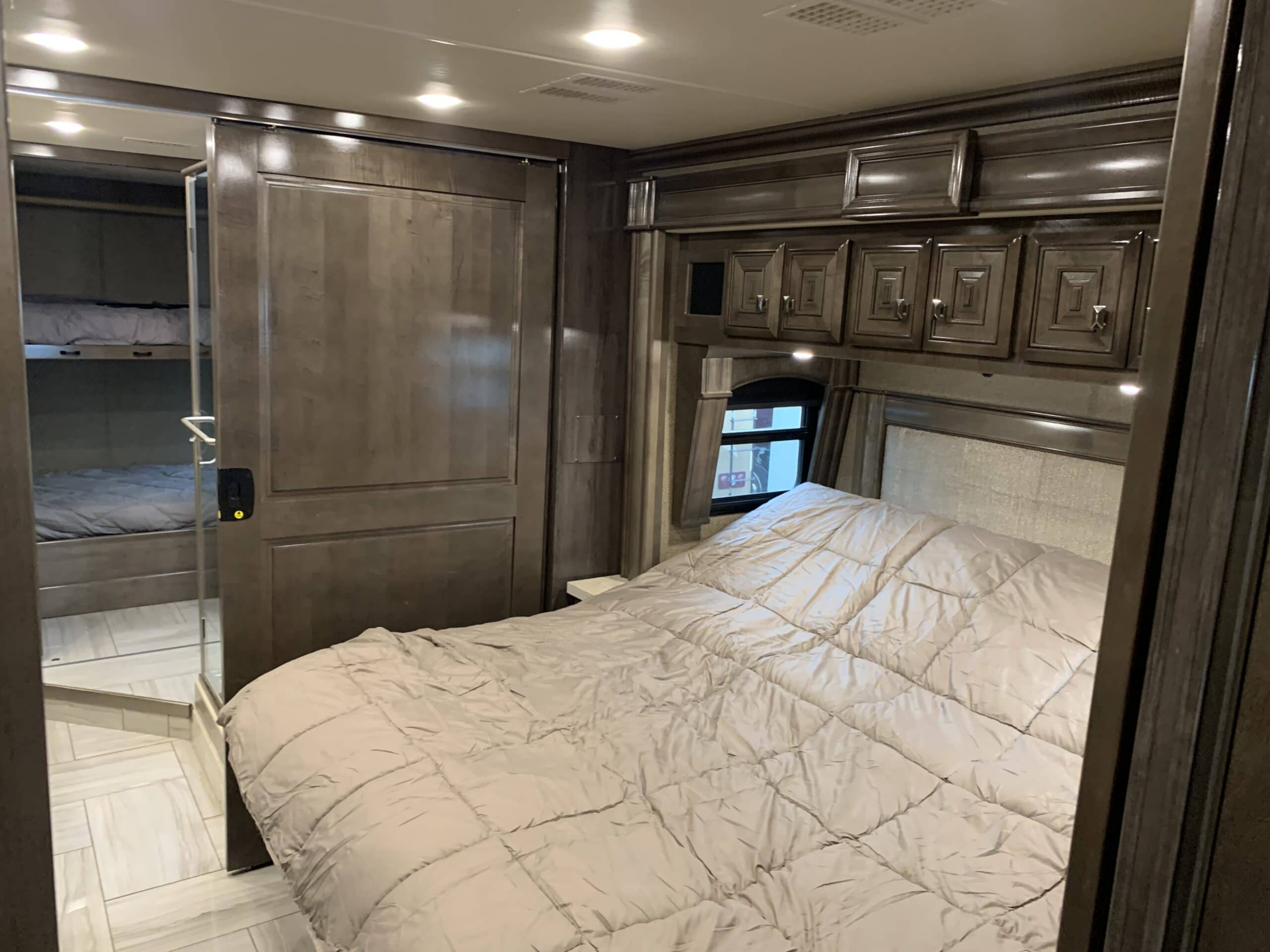 2019-Fleetwood-Discovery-44B-16k-miles-4-slides-bath-half-459hp-Cummins-prestigious-coach5-scaled-1