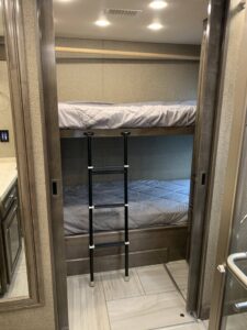 2019-Fleetwood-Discovery-44B-16k-miles-4-slides-bath-half-459hp-Cummins-prestigious-coach6-scaled-1